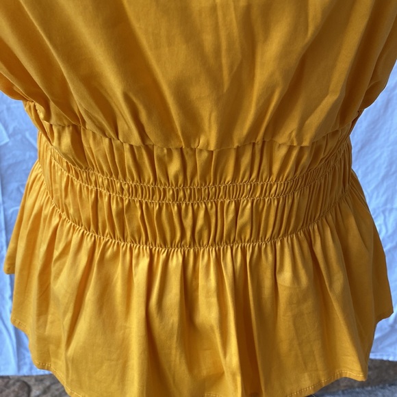 White House Black market beautiful gold colored halter top. - Picture 2 of 6